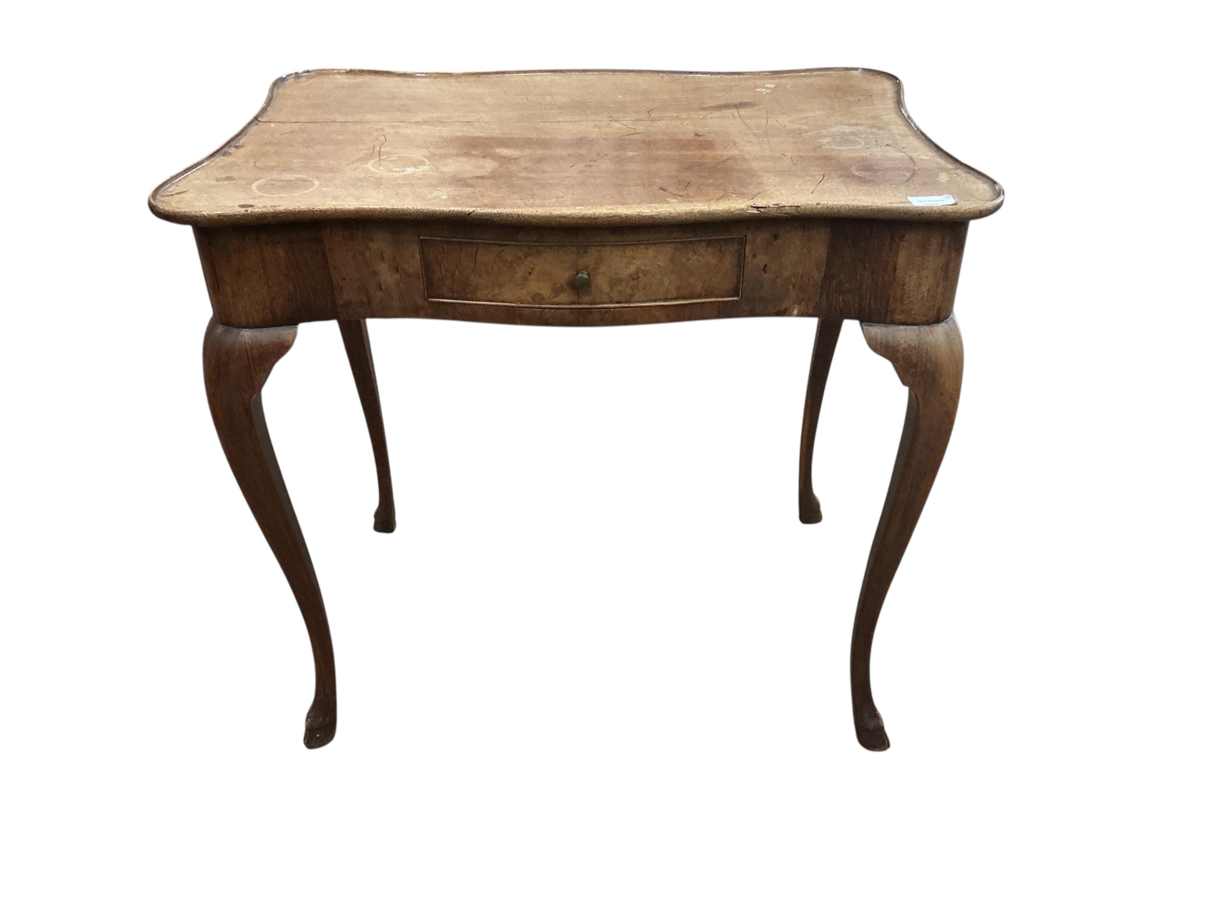 An 18th century rectangular mahogany serpentine side table, fitted with a single drawer, on cabriole legs, width 78cm, depth 53cm, height 72cm